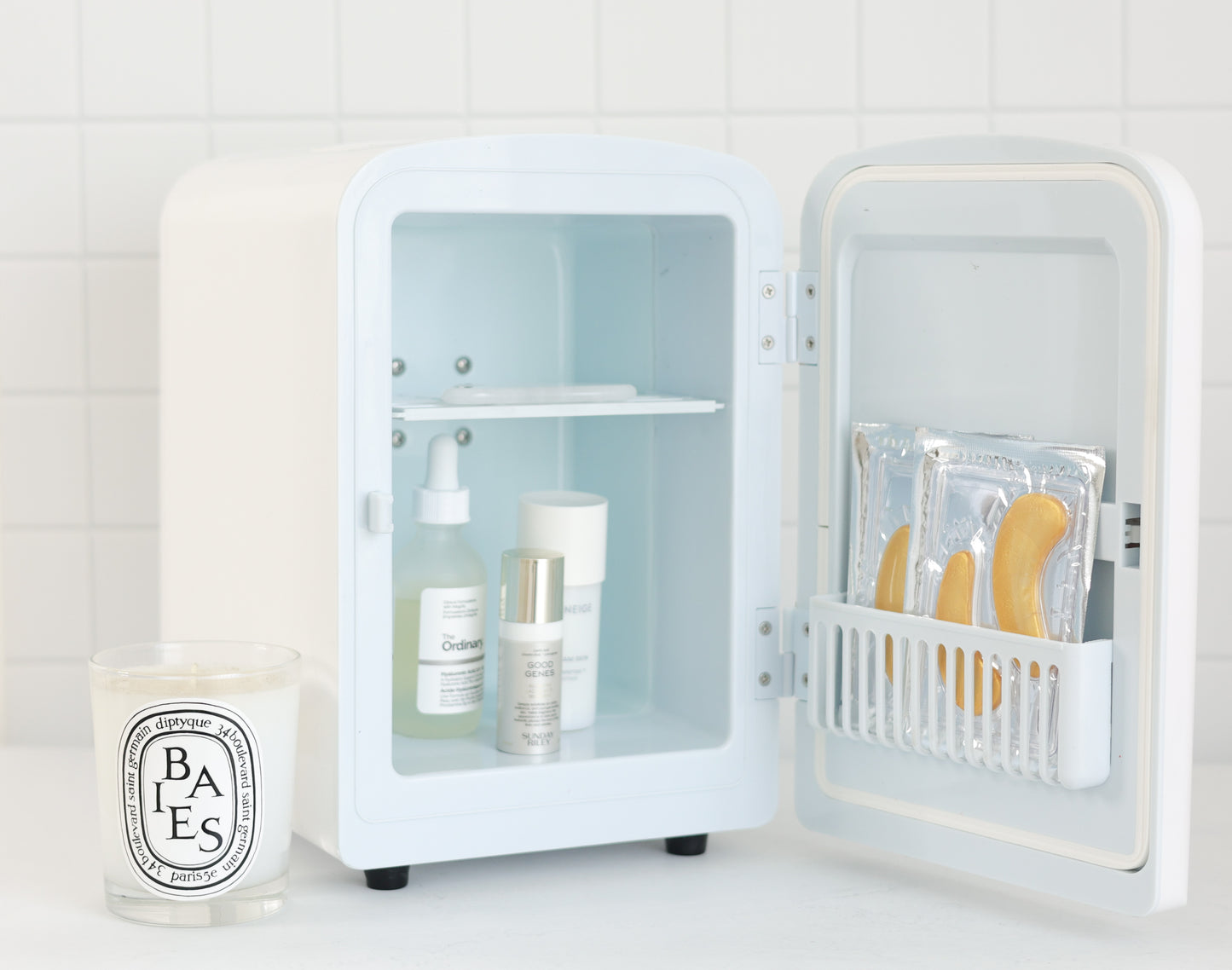Cool Girl Fridge in vanilla white – styled on vanity desk with skincare