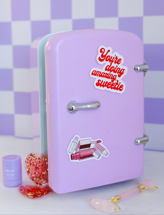 lavender luxe cool girl fridge styled on vanity with skincare and beauty tools