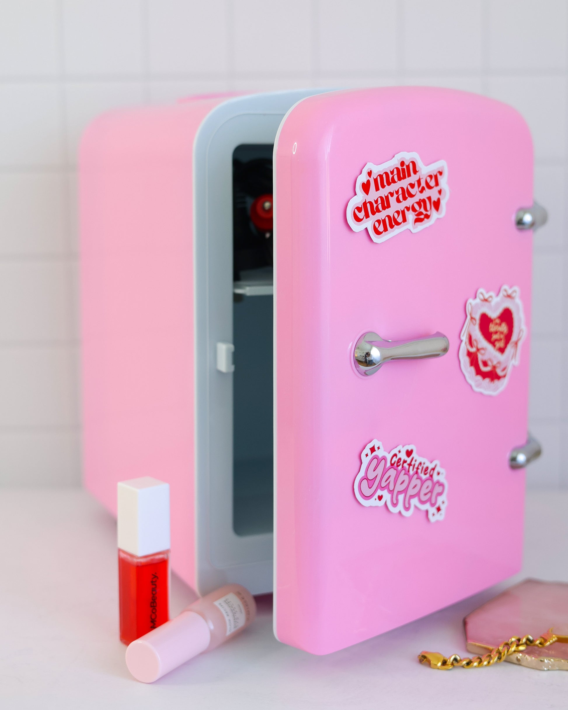 Cool Girl Fridge in pastel bubblegum pink – styled on vanity desk with skincare, and aesthetic vinyl stickers
