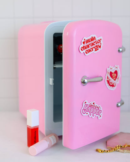 Cool Girl Fridge in pastel bubblegum pink – styled on vanity desk with skincare, and aesthetic vinyl stickers